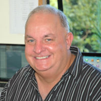 Steve Punter smiling, from the Canva Steve’s Story page